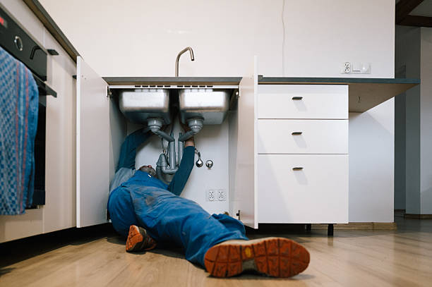 Professional Drain Cleaning technician working in Caldwell, KS